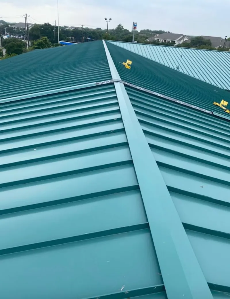 Green commercial metal roof ridge and valley for Metal Roof Repair in Gladeview